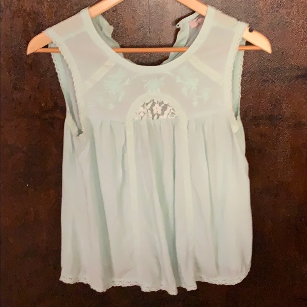 Sea green top.
